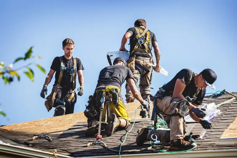 Roofing crew at work near Barrie